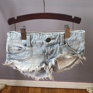 Billabong girls cut-off denim shorts.